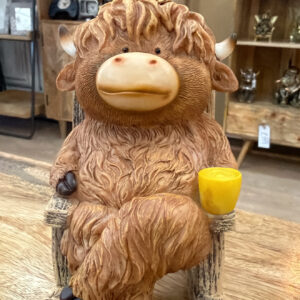 Highland Cow On Rocking Chair